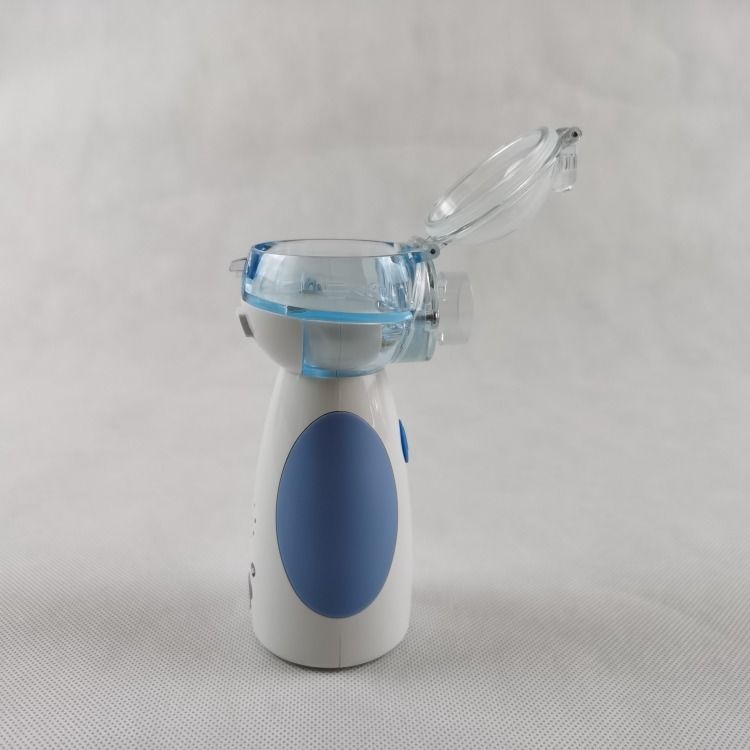 Para uso doméstico Inhalador portátil Inhalador para uso doméstico Médico Ce Aprobado de malla Nebulizador eléctrico portátil gratuito